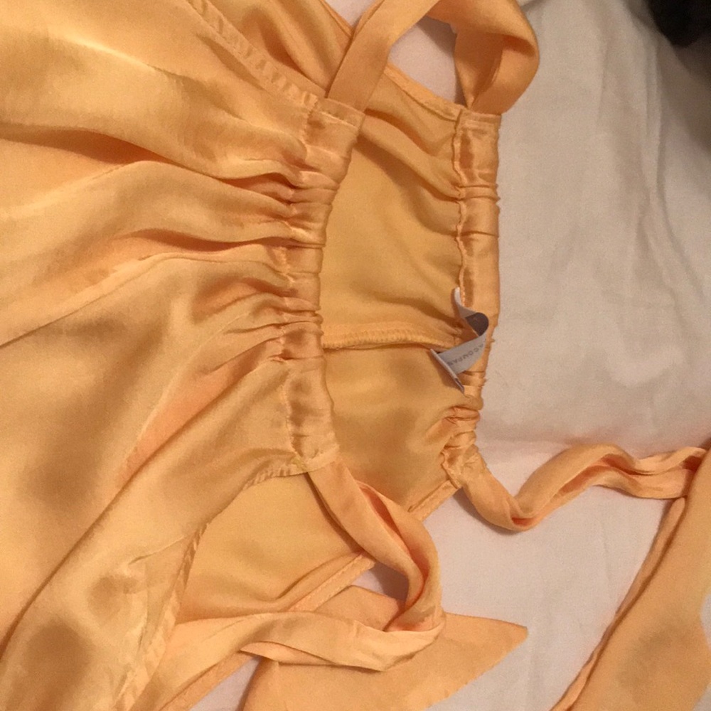 Woman’s sleeveless satiny top